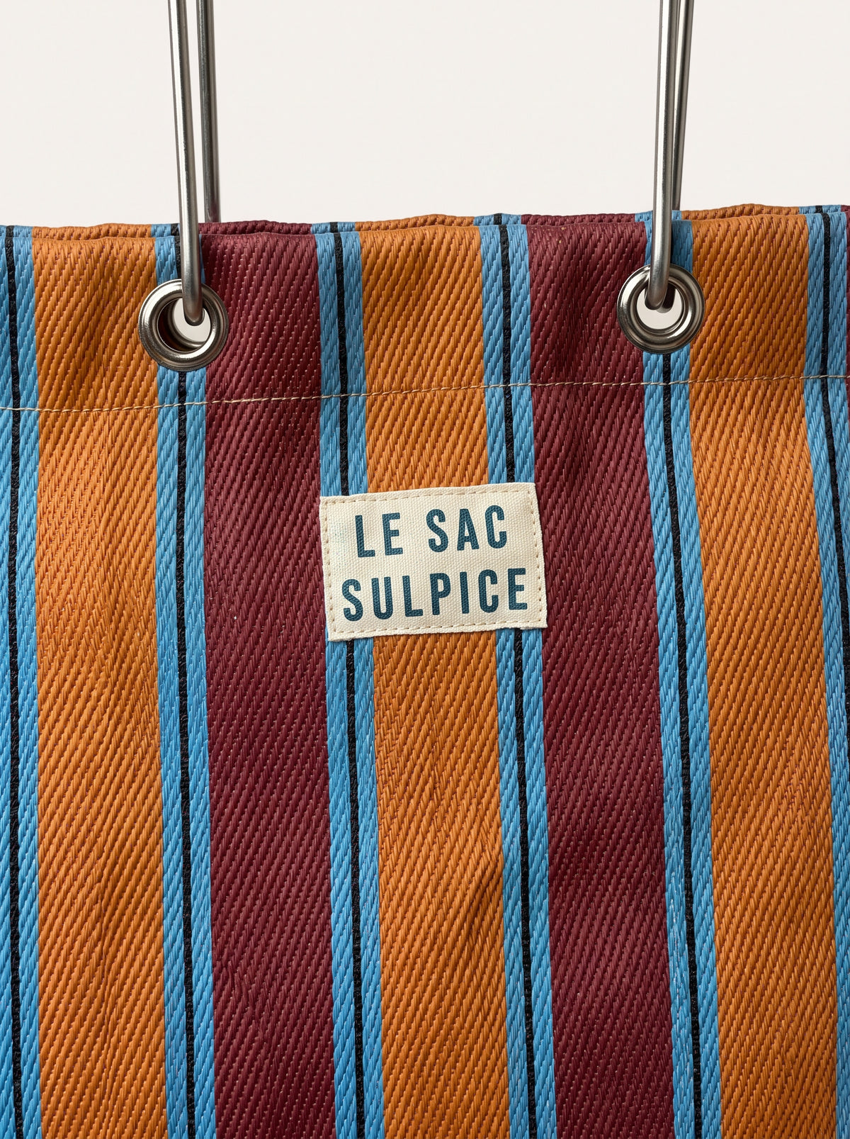 Portofino medium striped tote bag in Sunrise with leather-wrapped metal handles, view 3